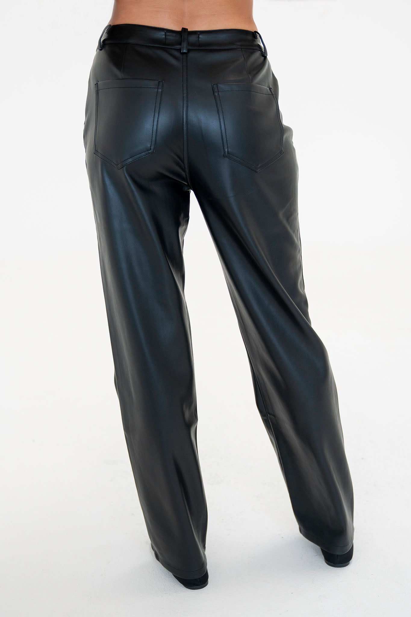 View 4 of Raywood Straight Leg Vegan Leather Pants, a Pants from Larrea Cove. Detail: .