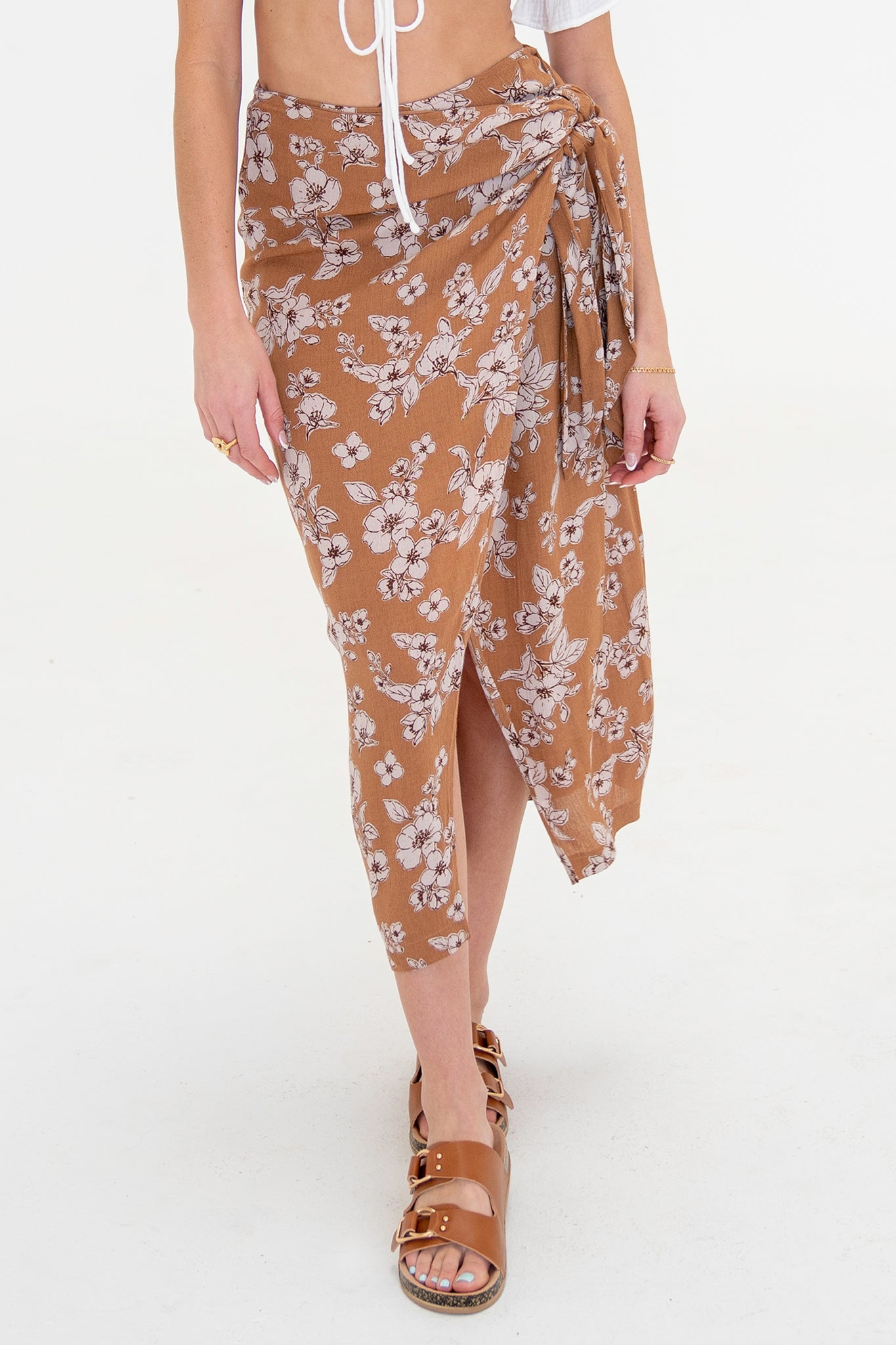 View 1 of Bloom Wrap Skirt, a Skirts from Larrea Cove. Detail: 
Show off your blooming summer style with the Bl...