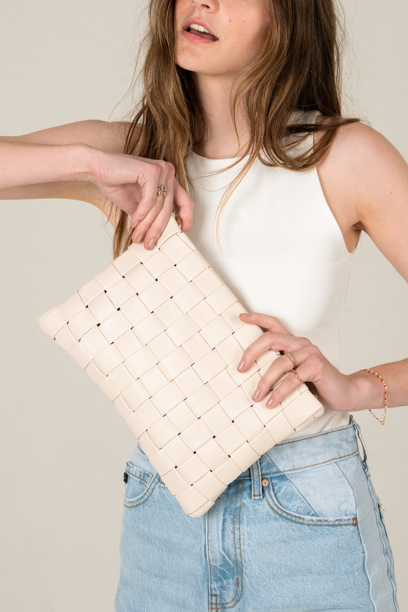View 8 of Keen Woven Clutch in Ivory, a Bags from Larrea Cove. Detail: .