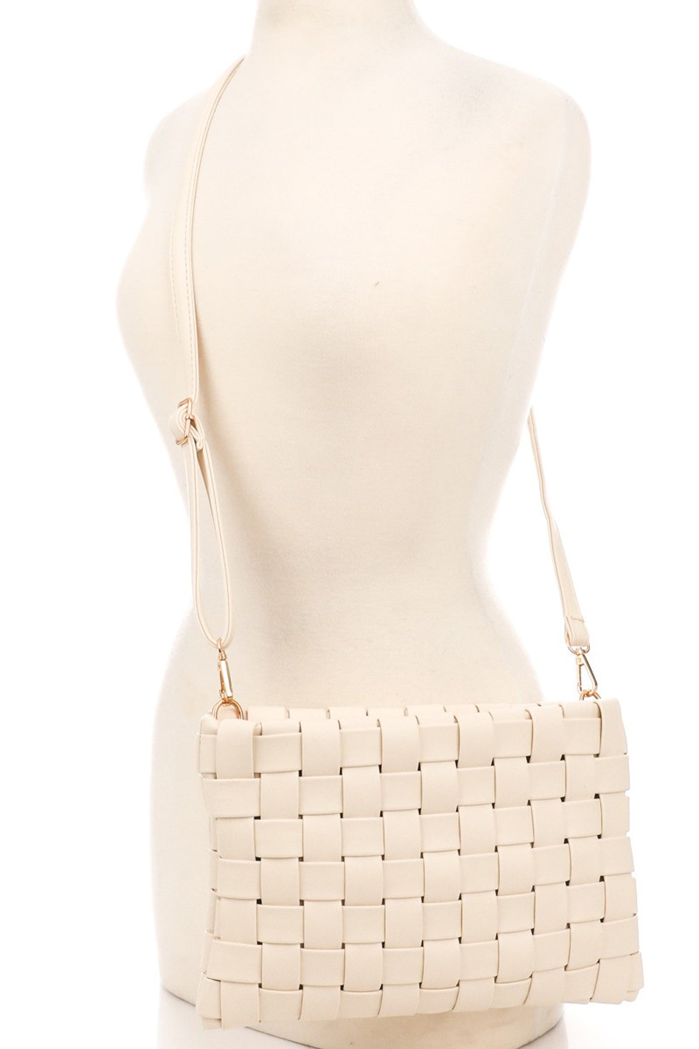 View 5 of Keen Woven Clutch in Ivory, a Bags from Larrea Cove. Detail: .