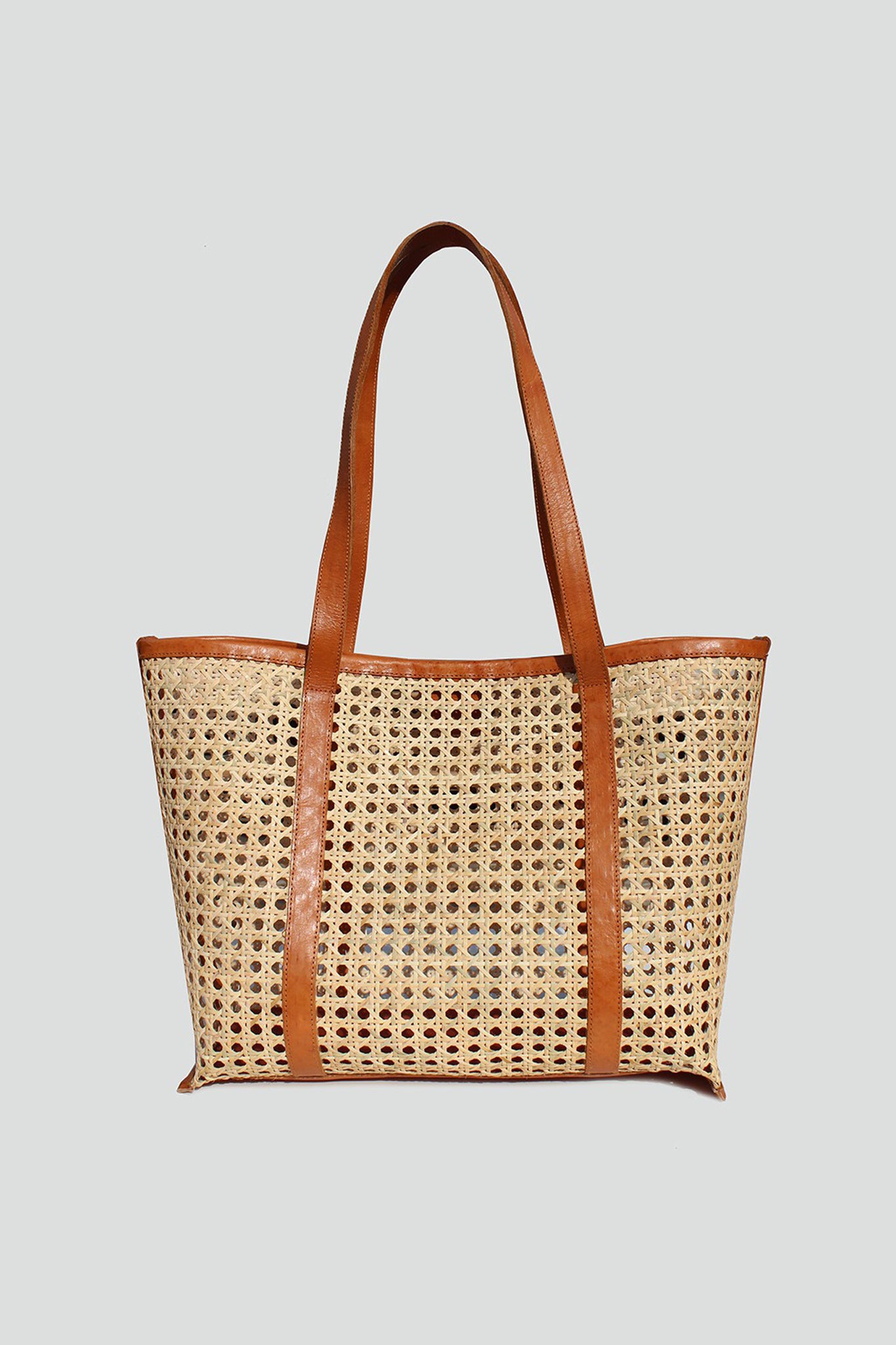 View 1 of Nusa Tote in Tan, a Bags from Larrea Cove. Detail: Take your beach vibes to the next level with the Nusa Tote in Tan.