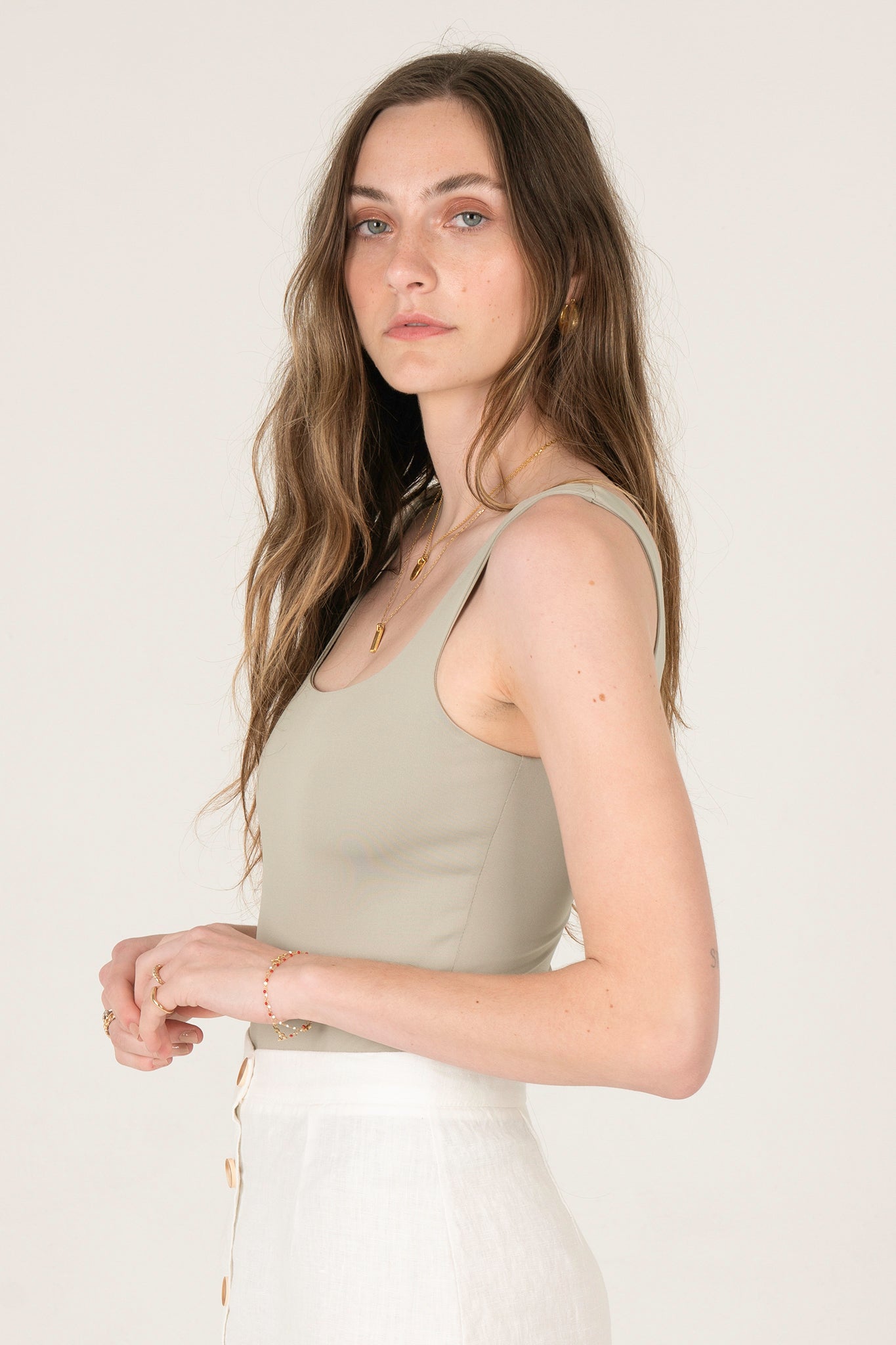 View 2 of Cara Square Neck Bodysuit in Light Sage, a Bodysuits from Larrea Cove. Detail: .
