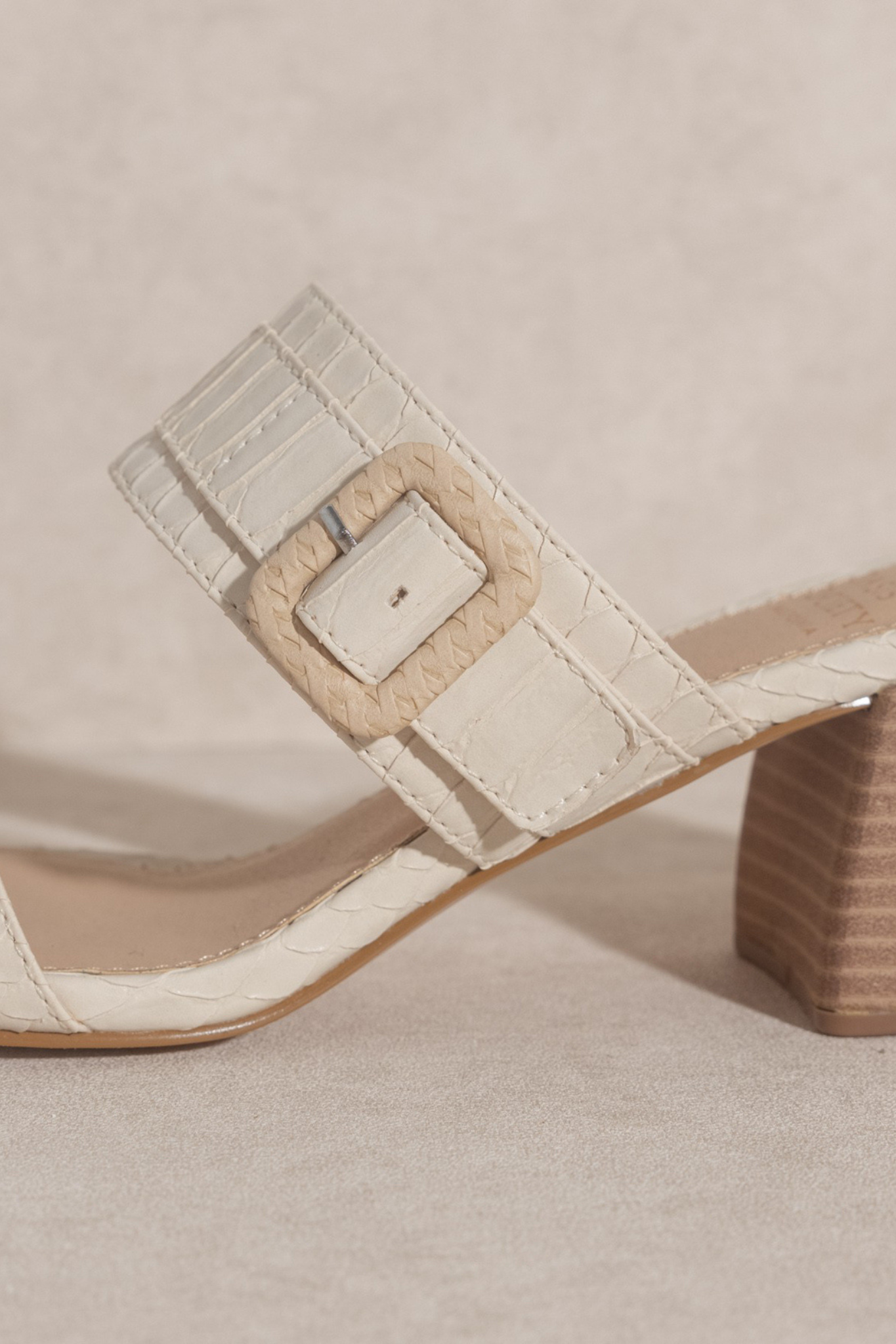 View 2 of Nicole Buckle Block Heel in Off White, a Shoes from Larrea Cove. Detail: .